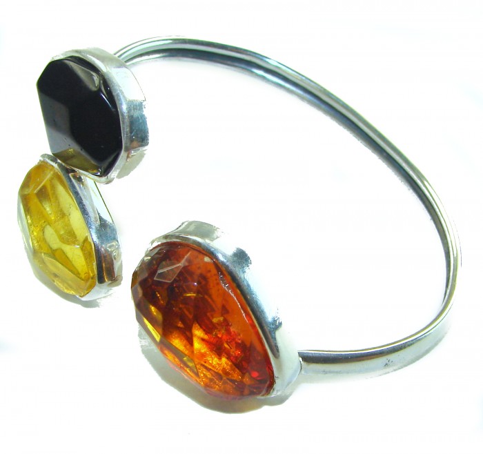 Vintage Design Genuine 29.5 carat faceted Baltic Amber .925 Sterling Silver handmade Bracelet - Bracelet with faceted Baltic amber stones, side view.