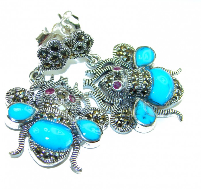 Blue Bees inlay Turquoise Ruby Marcasite .925 Sterling Silver Handcrafted earrings - Close-up of turquoise and ruby bee earrings with marcasite details