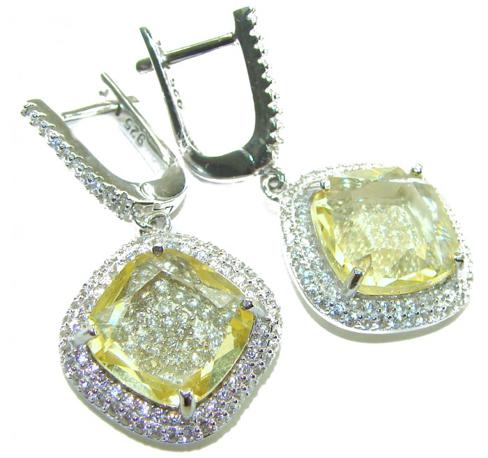 Vivien Luxurious Style - Natural 8.2 carat Citrine .925 Sterling Silver dipped in Rhodium handmade earrings - Close-up of citrine earrings with diamond accents, showcasing clasp detail.