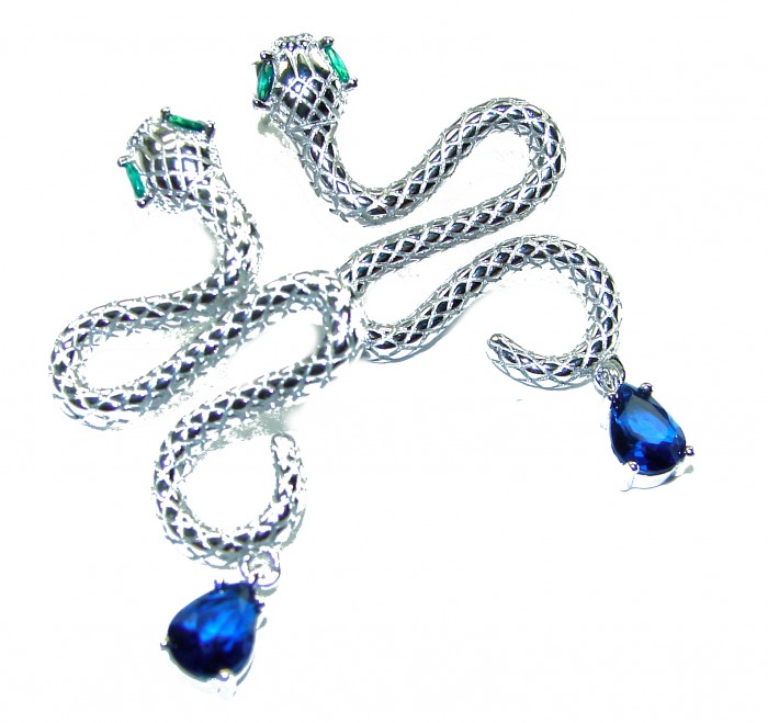Golden Cobra Snakes 1.5 carat Sapphire .925 Sterling Silver earrings - Silver snake earrings with sapphires and emeralds, top view.