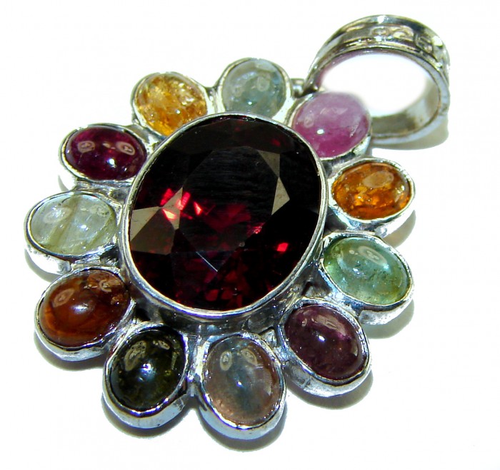 Authentic 8.5 carat Ruby Tourmaline .925 Sterling Silver handcrafted Pendant - Close-up of multi-gemstone pendant with central ruby, silver setting