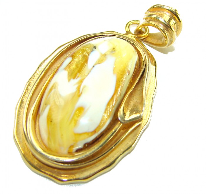 Prehistoric Authentic Buttescotch Baltic Amber 14K Gold over .925 Sterling Silver beautifully handcrafted Pendant - Gold pendant with butterscotch amber, angled view displaying stone detail.
