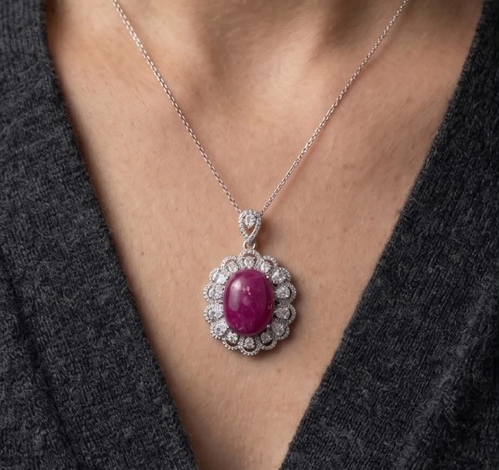 Rare 16.2 carat authentic Star Ruby rhodium over .925 Sterling Silver handmade Statement Pendant - Star Ruby pendant worn, close-up view. Rhodium over .925 silver.