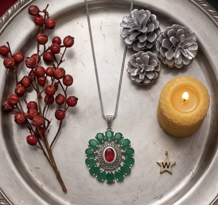Giovanna 22.2 carat authentic Mozambique Ruby Emerald .925 Sterling Silver handmade Pendant - Necklace with ruby and emerald, top view on decorative silver tray.