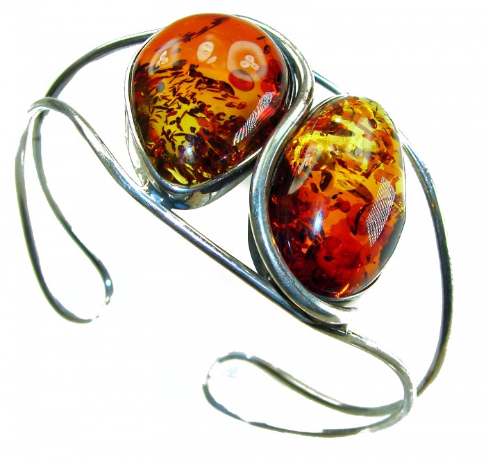 Huge Genuine Golden Baltic Amber highly polished .925 Sterling Silver handcrafted Bracelet / Cuff - Close-up of Baltic amber bracelet with polished silver setting