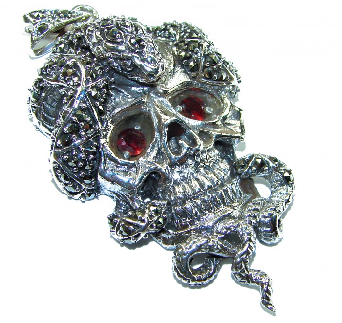 the cycle of renewal 2.1 carat Ruby Authentic Ruby Marcasite .925 Sterling Silver handcrafted Pendant - Skull pendant with ruby eyes and snake design, front view.