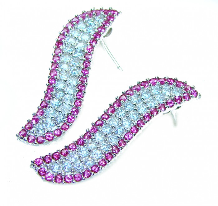 2.2 carat Ruby .925 Sterling Silver handcrafted earrings - Arched ruby and silver earrings, top view, 2.2 carats, handcrafted.