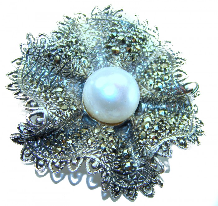 Genuine white Pearl Marcasite .925 Sterling Silver handcrafted Brooch - Close-up of a genuine white pearl and marcasite sterling silver brooch.
