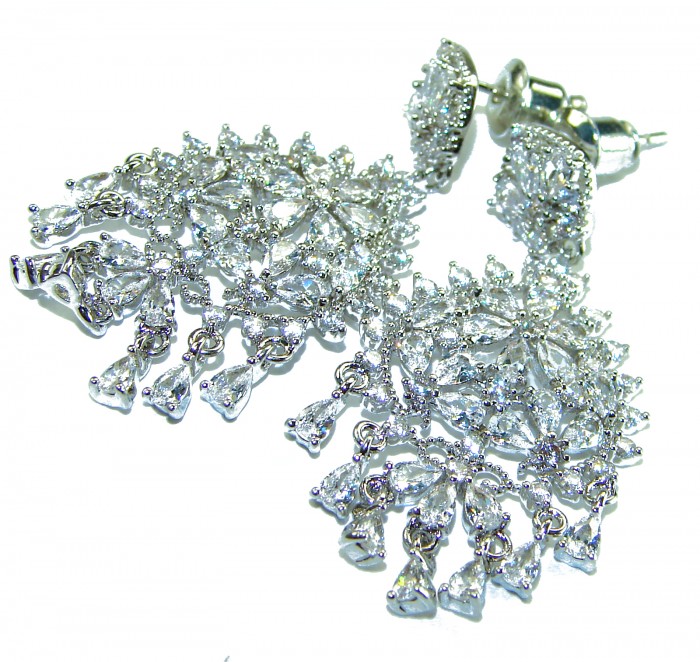 Precious genuine 11.9 carat White Topaz .925 Sterling Silver handcrafted earrings - Close-up of dangling white topaz earrings in sterling silver.