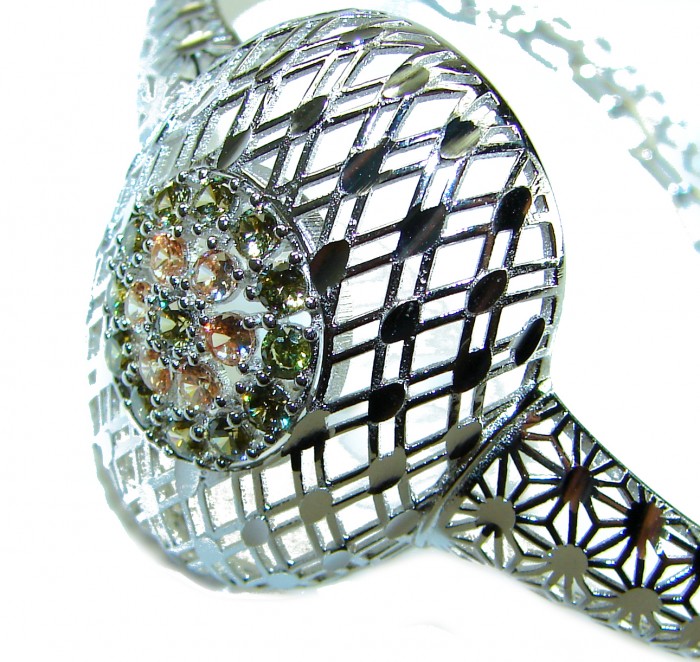 Aphrodite - Solid 4.5 multicolor Sapphire .925 Sterling Silver handcrafted Bracelet - Close-up of multicolor sapphire detail in sterling silver jewelry piece.