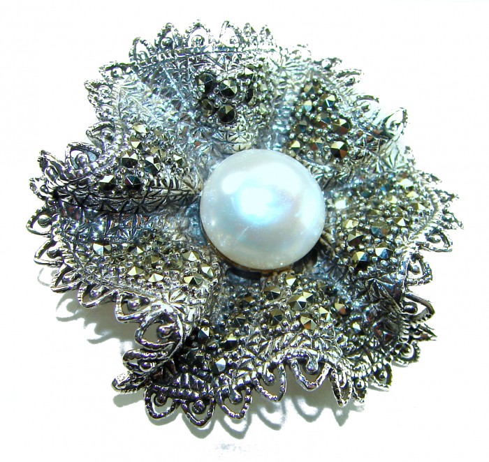 Genuine white Pearl Marcasite .925 Sterling Silver handcrafted Brooch - Close-up of white pearl and marcasite silver brooch detailing.