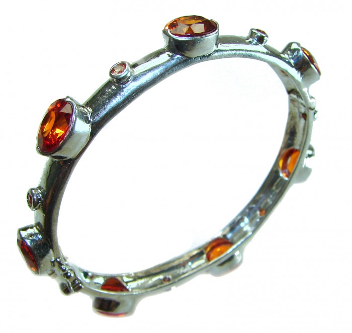 Red Galaxy Spectacular 25.2 carat authentic Ruby .925 Sterling Silver handmade bangle Bracelet - Side view of Red Galaxy Spectacular ruby bracelet with .925 sterling silver