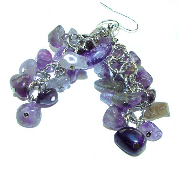 Purple Beauty - authentic 28.7 carat Amethyst .925 Sterling Silver handcrafted earrings - Amethyst earrings close-up on white background.
