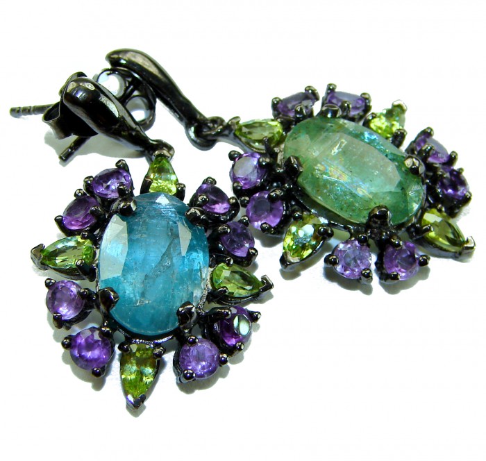 Fabulous 20.7 carat Aquamarine black rhodium over .925 Sterling Silver Handcrafted Statement earrings - Close-up of aquamarine earrings with purple and green stones.