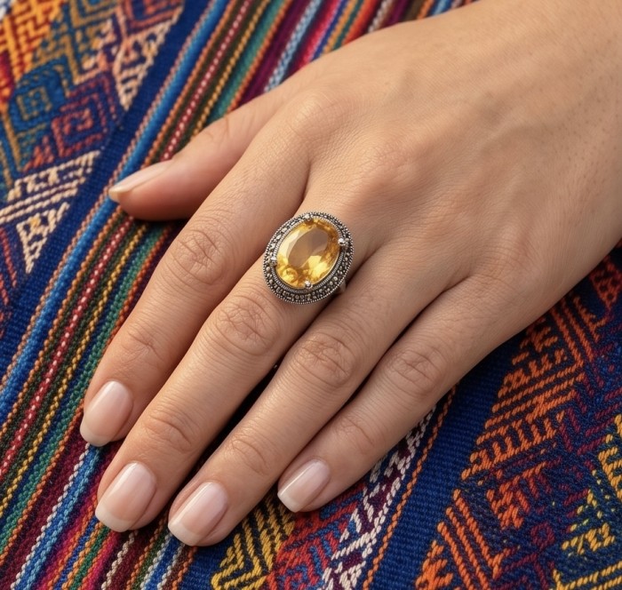 Costa del Sol 25.4 carat Lemon Quartz rhodium over .925 Sterling Silver handcrafted ring size 8 - Lemon Quartz ring worn on hand, colorful patterned background.
