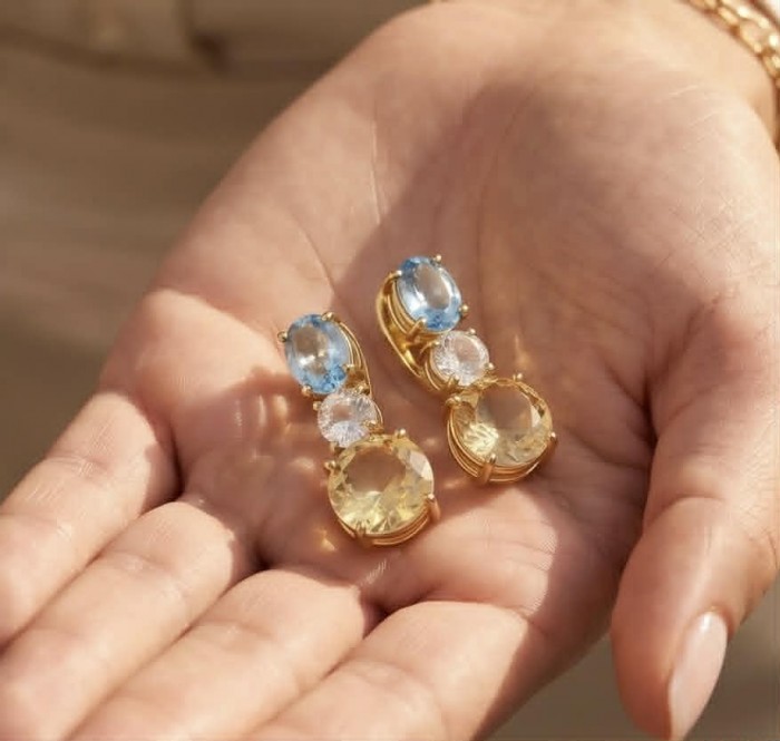 Fiesta Authentic 12.5 carat Multigem .925 Sterling Silver dipped in 18K Gold over brilliantly handcrafted earrings - Close-up of Fiesta Authentic multigem earrings in hand.