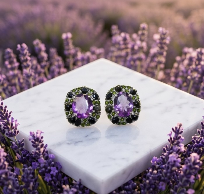 Francesca Genuine 8.9 carat Brazilian Amethyst rhodium over .925 Sterling Silver handcrafted Statement handcrafted earrings - Close-up of amethyst earrings on marble with lavender background.