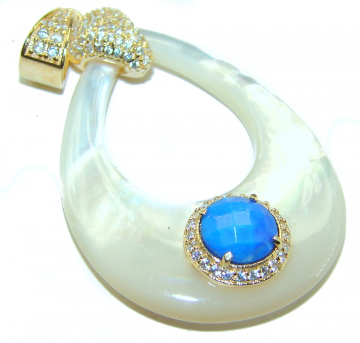 Genuine Blister Pearl lab grown Diamond 18K Gold over .925 Sterling Silver Statement pendant - Close-up of pearl pendant with blue stone and diamonds, gold accents