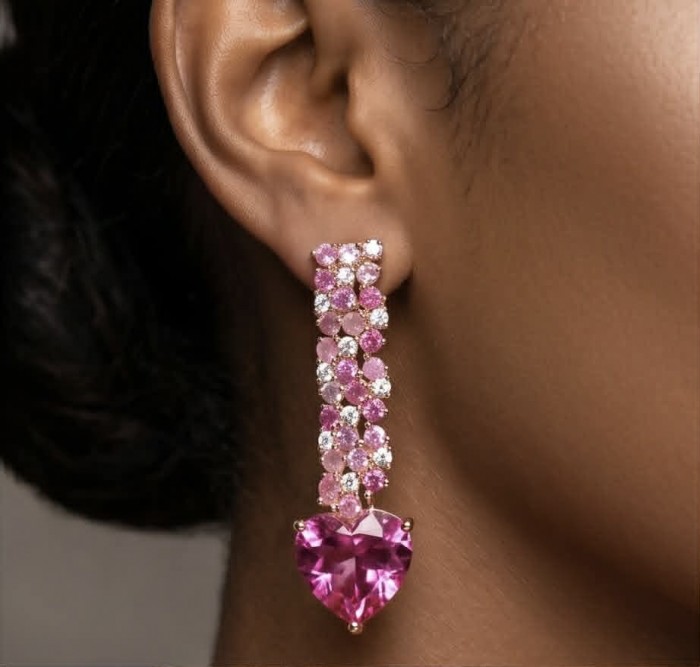 Pure Love - authentic 18.5 carat Pink Topaz 18K Rose Gold over .925 Sterling Silver handcrafted Earrings - Earring with pink topaz and rose gold, worn on ear, close-up view.