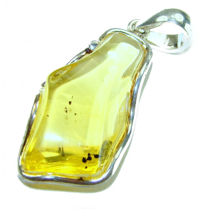 Prehistoric Authentic Baltic Amber .925 Sterling Silver beautifully handcrafted Large Pendant - Close-up of Baltic amber pendant in sterling silver setting