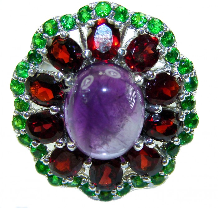 Lavender Beauty authentic 8.2 carat Amethyst .925 Sterling Silver Handcrafted Ring size 8 1/4 - Close-up of a colorful gemstone ring with amethyst and garnet accents