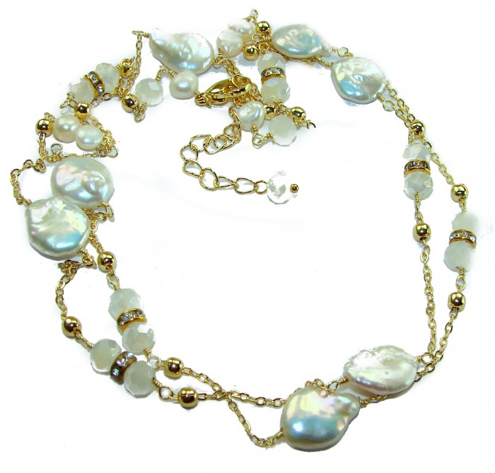 34 inches Outstanding Brazilian Mother of pearl .925 Sterling Silver handcrafted Statement necklace - 34-inch Brazilian pearl necklace with gold accents, laid flat.