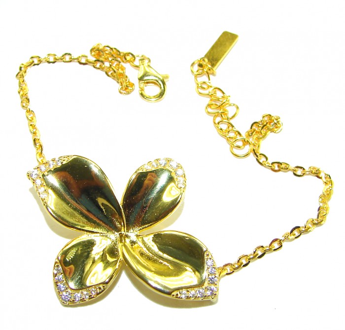 Lotus flower White Topaz highly polished 18K Gold over .925 Sterling Silver Italy made bracelet - Gold lotus flower bracelet with white topaz, top view.