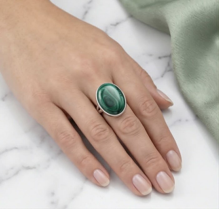 Green Passion 26.2 CARAT genuine Malachite from Utah .925 Sterling Silver handcrafted ring size 8 adjustable - Oval malachite ring worn on hand, top view.