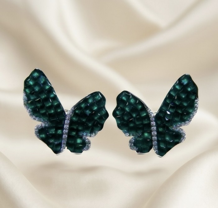 Incredible Butterflies genuine mystery setting 15.5 CARAT Emerald .925 Sterling Silver handcrafted Earrings - Butterfly gemstone earrings on a cream background, front view.