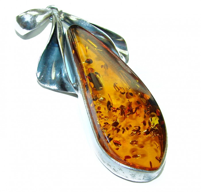 Prehistoric Authentic Baltic Amber .925 Sterling Silver beautifully handcrafted Pendant - Amber and silver pendant close-up, side view