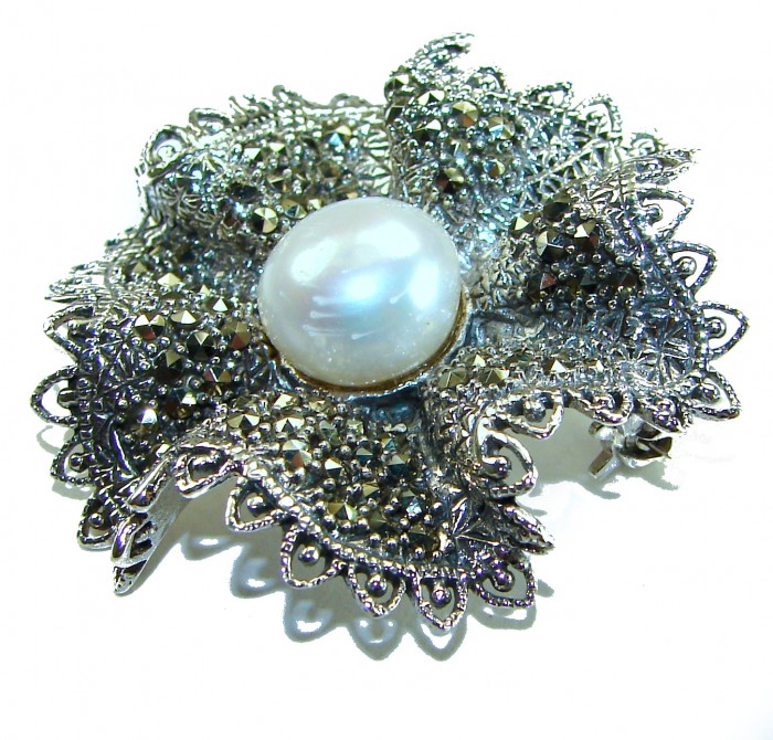 Genuine white Pearl Marcasite .925 Sterling Silver handcrafted Brooch - Close-up of handcrafted pearl and marcasite silver brooch.