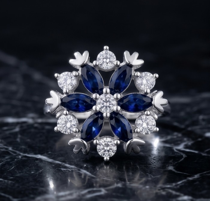 Real 3.2 carat Sapphire Italy Made Silver Sterling Silver spinning ring s. 8 1/4 - Sapphire and diamond silver ring, top view, on a marble background.