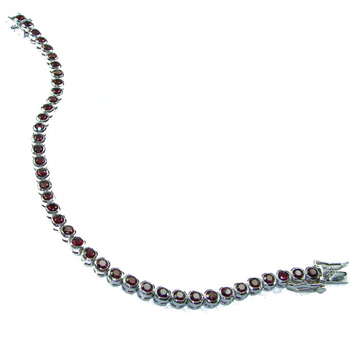Penelope authentic 12.5 CARAT GARNET .925 Sterling Silver handcrafted bracelet - Garnet tennis bracelet, sterling silver, angled view with clasp detail.