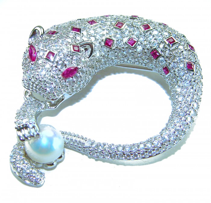 Gephard Natural 7.8 carat Ruby Pearl .925 Sterling Silver handmade pendant - Panther-shaped bracelet with rubies and pearl, top view detailing stones.