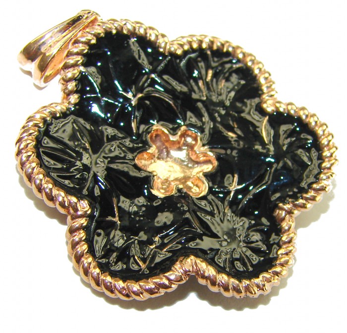 Dubai Style - Golden Flowers black enamel .925 Sterling Silver dipped in 22K Rose Gold handmade Pendant - Close-up of black enamel flower pendant with gold details.