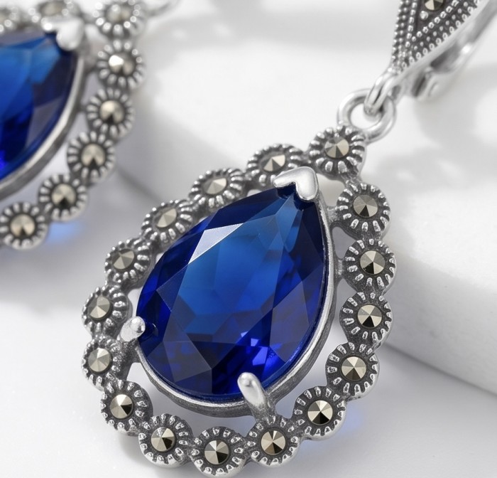 Julietta 15.5 carat London Blue Topaz Marcasite .925 Sterling Silver handmade Statement earrings - Close-up of Julietta 15.5 carat London Blue Topaz with marcasite accents