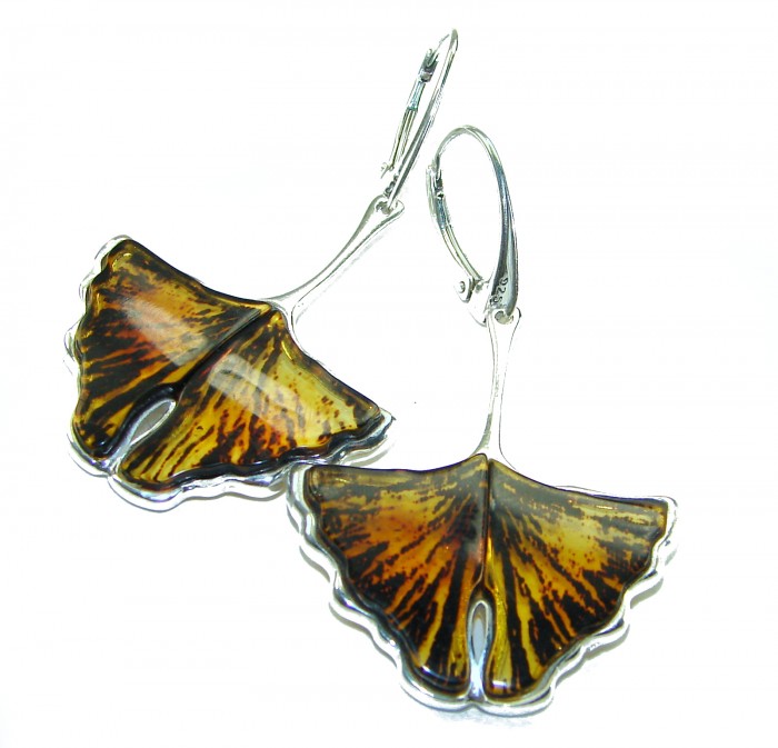 Wonderful Butterflies carved Baltic Polish Amber .925 Sterling Silver earrings - Butterfly-shaped amber earrings, front view, silver clasps visible.