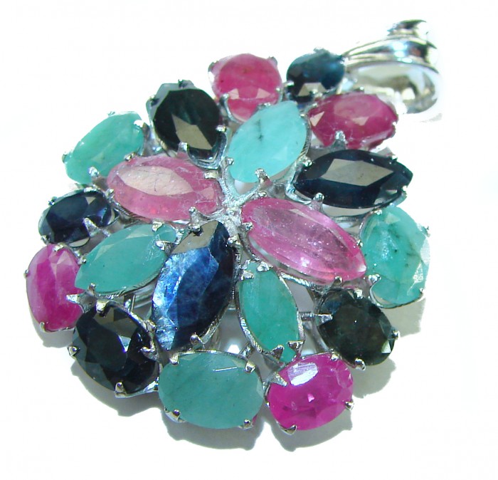 aUTHENTIC Red Ruby Emerald Sapphire 24.5 carat .925 Sterling Silver handmade Pendant - Multi-gem pendant, top view, showcasing vibrant rubies, emeralds, sapphires.