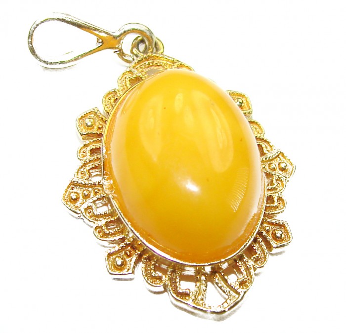 Gold of the Baltic Sea Authentic Butterscotch Baltic Amber 14K Gold over .925 Sterling Silver beautifully handcrafted Pendant - Close-up of butterscotch Baltic amber pendant with ornate gold setting