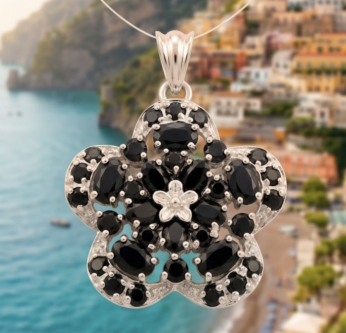 Genuine 5.5 carat Sapphire .925 Sterling Silver dipped in rhodium handmade Pendant - Close-up of floral sapphire pendant in sterling silver against scenic backdrop