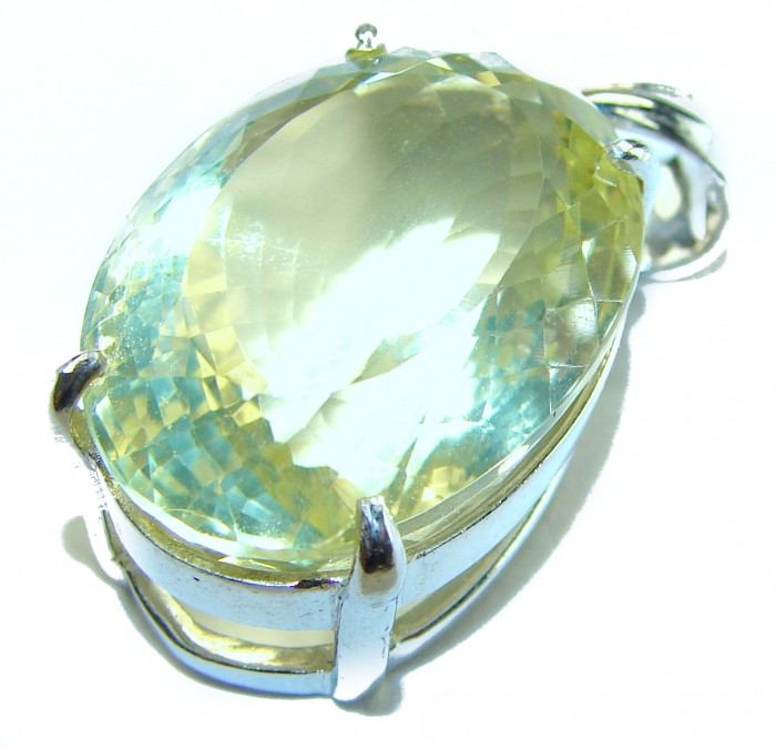 Perfection Oval cut 25.3 carat Lemon Quartz .925 Sterling Silver handcrafted pendant - Close-up of oval cut lemon quartz in .925 sterling silver setting