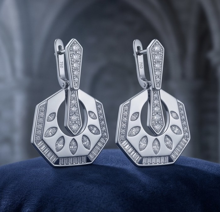 Modern design Natural 0.5 carat White Topaz .925 Sterling Silver handcrafted earrings - Close-up of modern white topaz earrings on a blue fabric background.