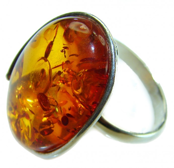 Beauty of the Nature Baltic Amber .925 Sterling Silver handcrafted ring; s. 9 adjustable - Close-up of Baltic amber and sterling silver ring.