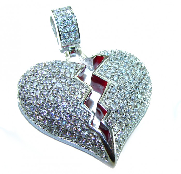 Broken Heart Luxurious 12.4 carat White Topaz .925 Sterling Silver handcrafted pendant - Broken heart pendant front view with white topaz on sterling silver.