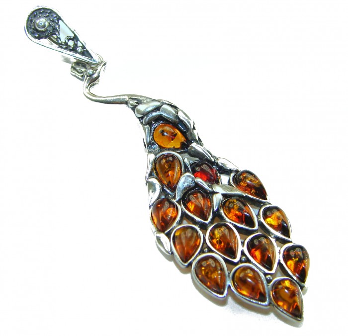 2 3/4 inches! Peacock Prehistoric Authentic Baltic Amber .925 Sterling Silver beautifully handcrafted Pendant - Peacock pendant with amber stones, detailed front view.