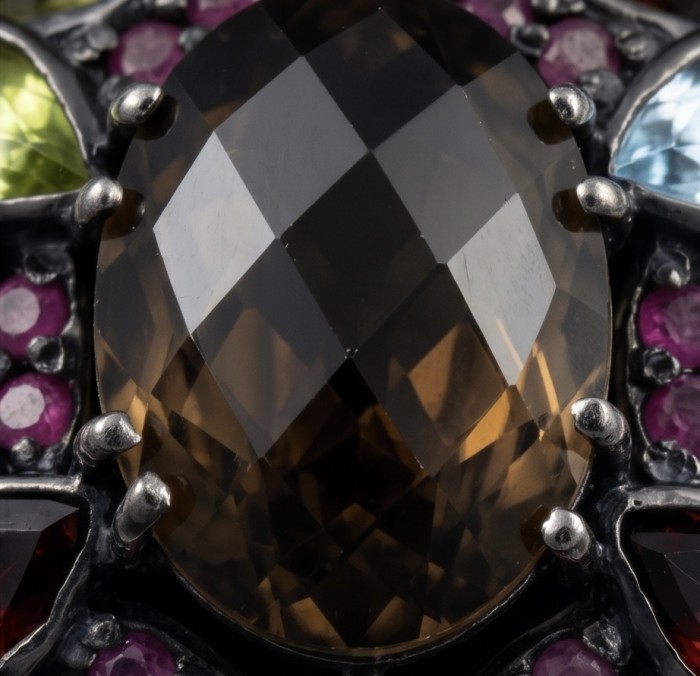 Vinatge Traesure Authentic 10.5 carat carved Smoky Topaz black rhodium over .925 Sterling Silver handmade Statement Pendant - Close-up of carved smoky topaz with vibrant surrounding gemstones.