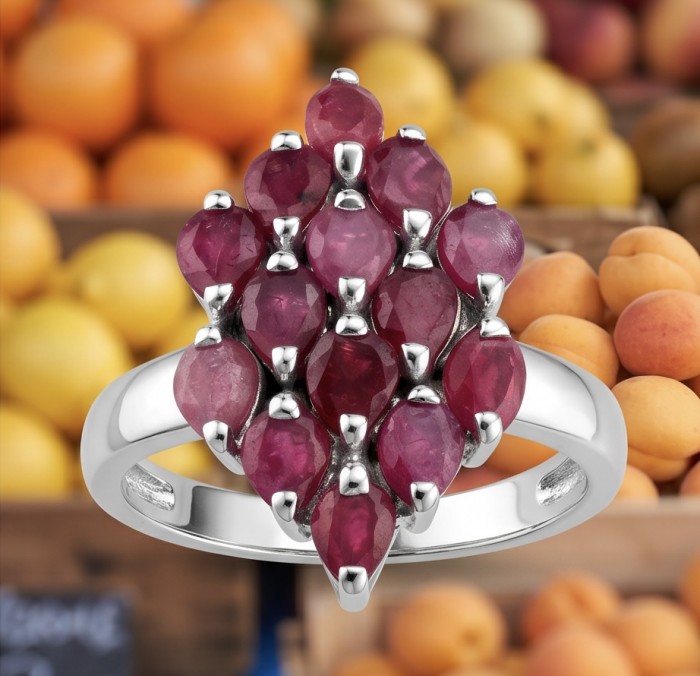 Giuseppina - Magnificent 12.5 carat authentic Ruby rhodium over .925 Sterling Silver handcrafted .925 Silver handcrafted Ring s. 8 - Ruby ring close-up with fruit background, showcasing stones and setting.