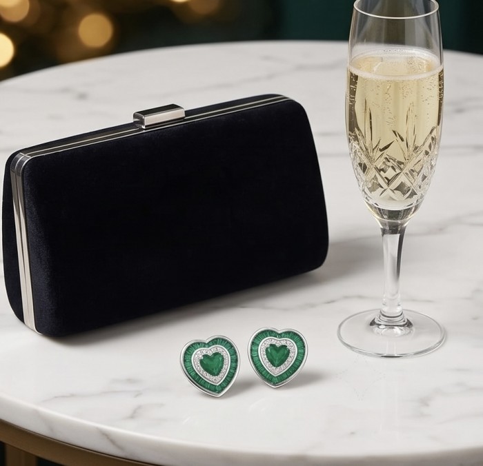 Art deco - My Sweet Heart Natural 2.8 carat Colombian Emerald .925 Sterling Silver Handcrafted Earrings - Colombian emerald heart earrings on table with clutch and champagne glass
