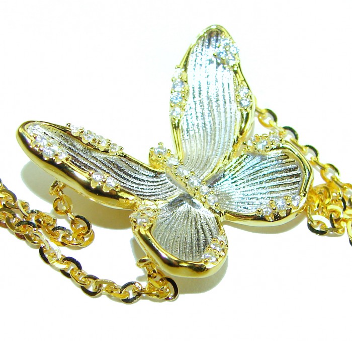 Golden Butterfly White Topaz highly polished 18K Gold over .925 Sterling Silver Italy made bracelet - Close-up of butterfly necklace with white topaz and gold detail.