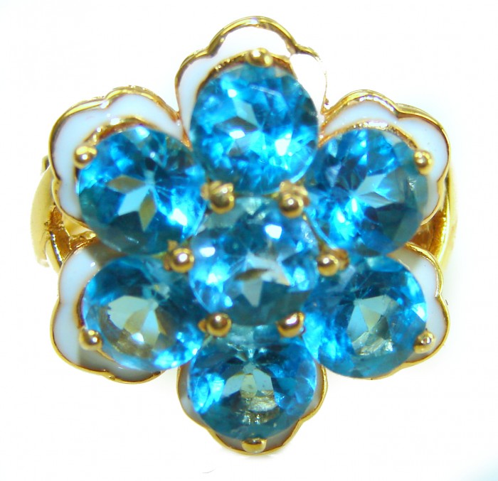 Forget-Me-Not Authentic 18.7 carat Swiss Blue Topaz white Enamel .925 Sterling Silver dipped in 22K Gold handcrafted Large ring size 7 3/4 - Close-up of Forget-Me-Not ring with blue topaz stones in gold setting.